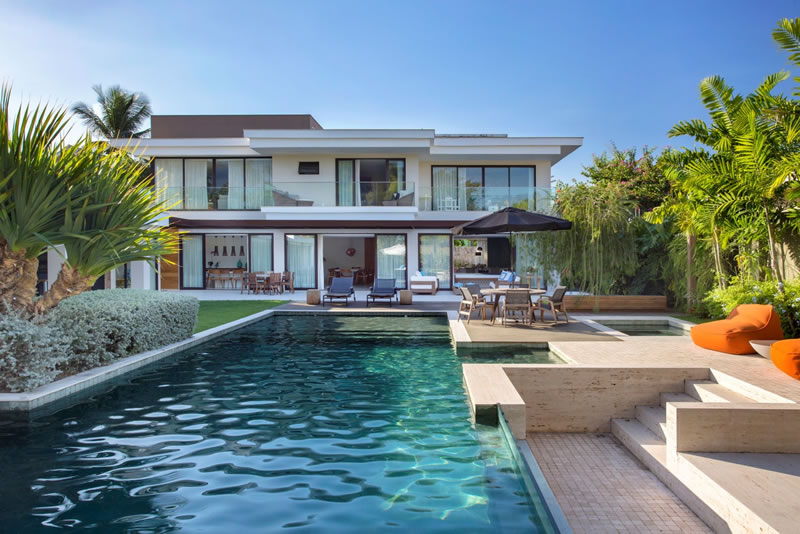 Projeto de paisagismo destaca áreas de lazer, descanso e convivência em torno da piscina - PISCINA